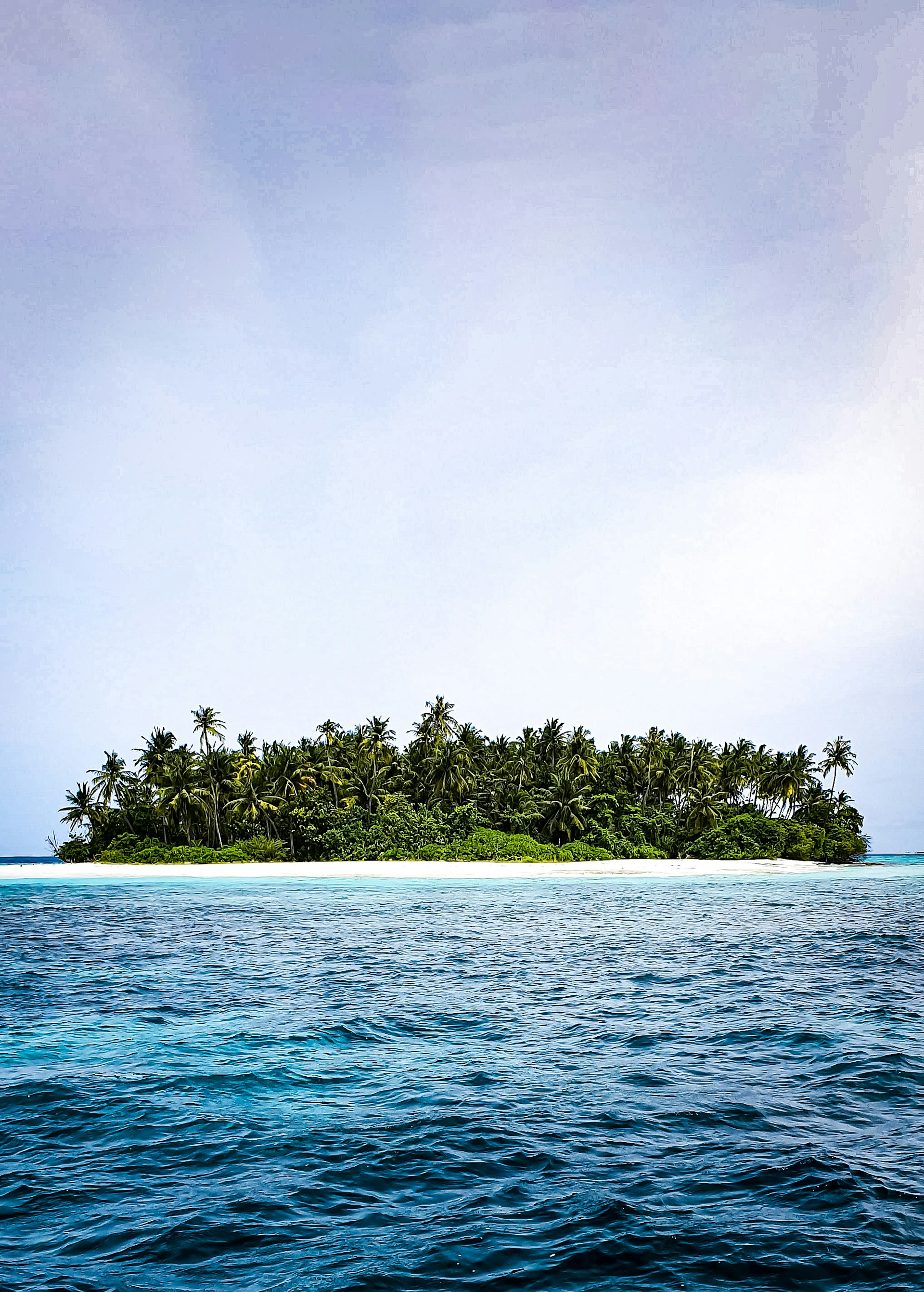Isla en el horizonte — Lemanjá, Polinesia Francesa